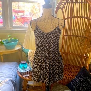 Navy with sunflower print romper